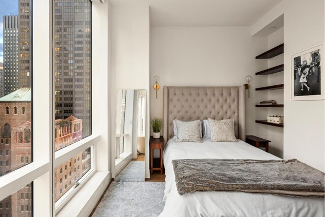 bedroom featuring multiple windows