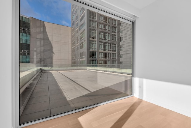 611 W 56th St Unit 4E, New York City, NY 10019 - bathroom featuring wood finished floors