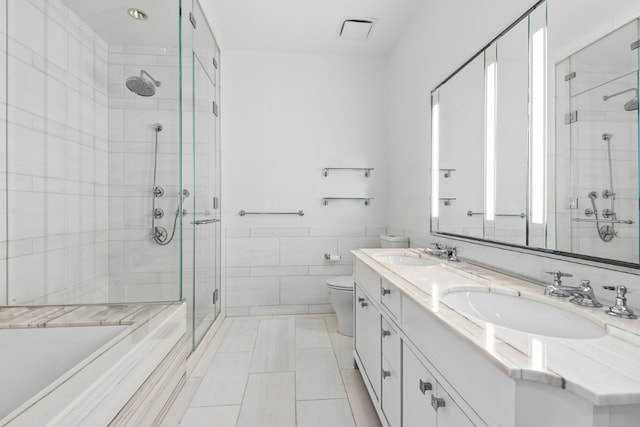 full bathroom featuring tile walls, tile patterned flooring, vanity, shower with separate bathtub, and toilet