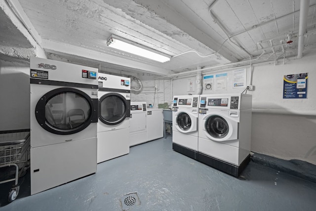 washroom with separate washer and dryer