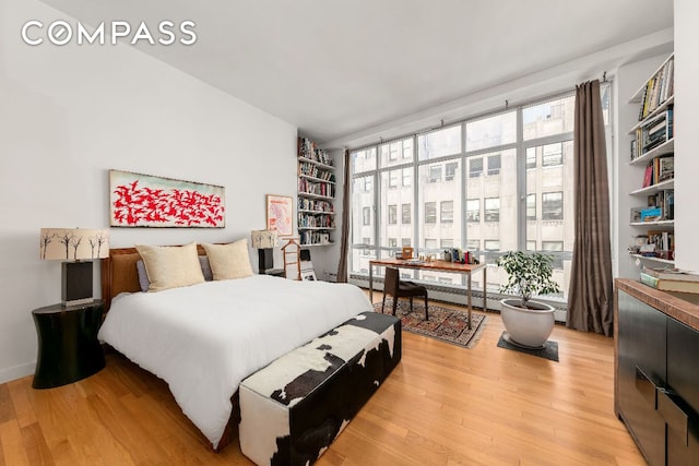 bedroom featuring light hardwood / wood-style flooring