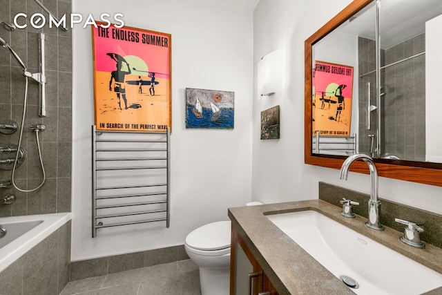 full bath featuring tiled shower / bath, tile patterned flooring, vanity, and toilet