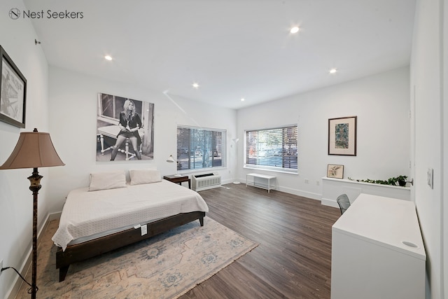 47-05 5th St Unit 203, New York City, NY 11101 - bedroom with dark wood finished floors, recessed lighting, and a wall mounted AC