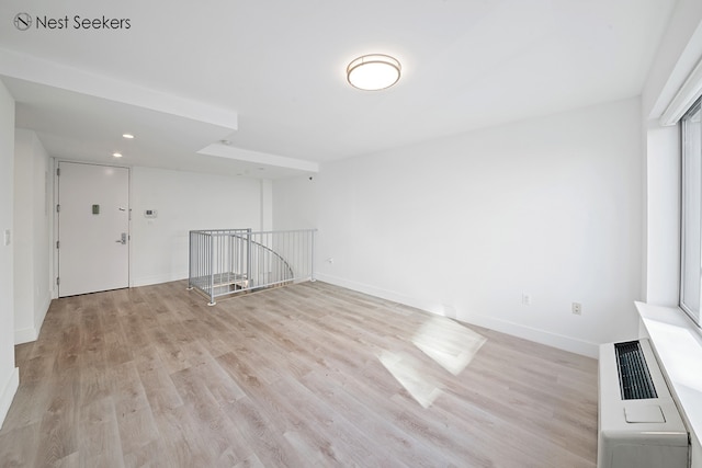 47-05 5th St Unit 203, New York City, NY 11101 - spare room with light wood-style floors and baseboards