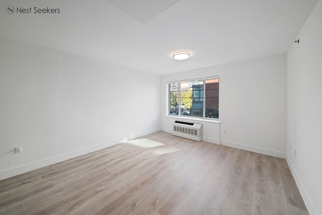 47-05 5th St Unit 203, New York City, NY 11101 - empty room featuring light wood finished floors and baseboards