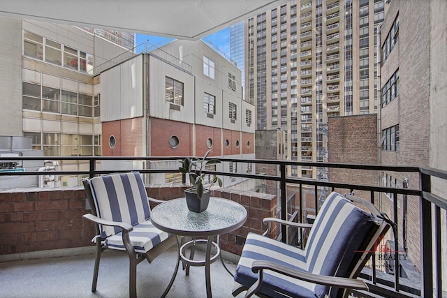 balcony featuring a view of city