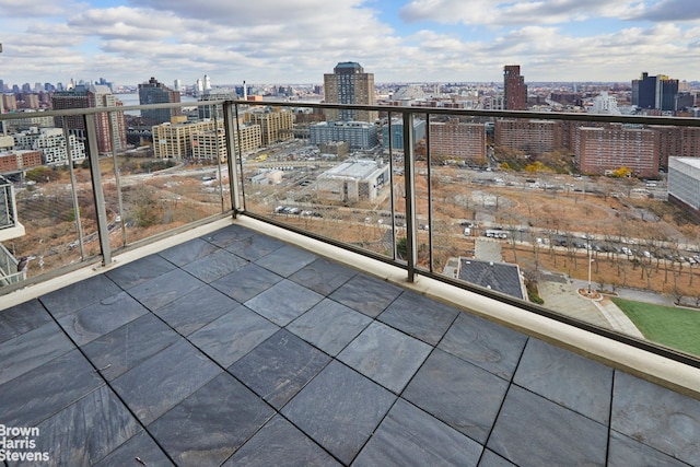 balcony featuring a city view