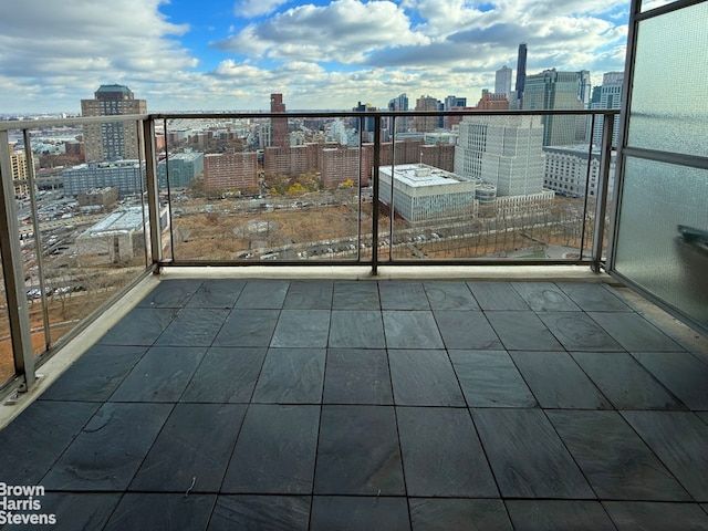 balcony featuring a city view