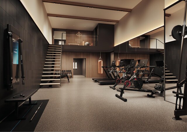 370 Lenox Ave Unit Ph8, New York City, NY 10027 - exercise room with a towering ceiling and beam ceiling