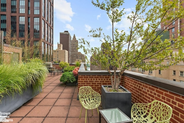 view of patio with a view of city