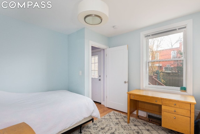 bedroom featuring light hardwood / wood-style floors