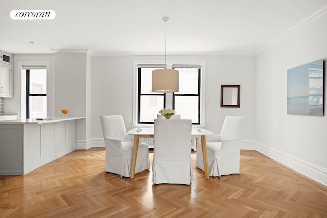 unfurnished dining area featuring baseboards, visible vents, and crown molding