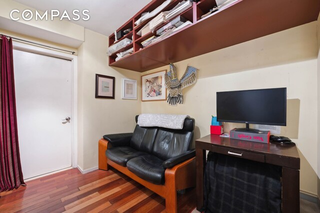 bedroom featuring dark wood-type flooring