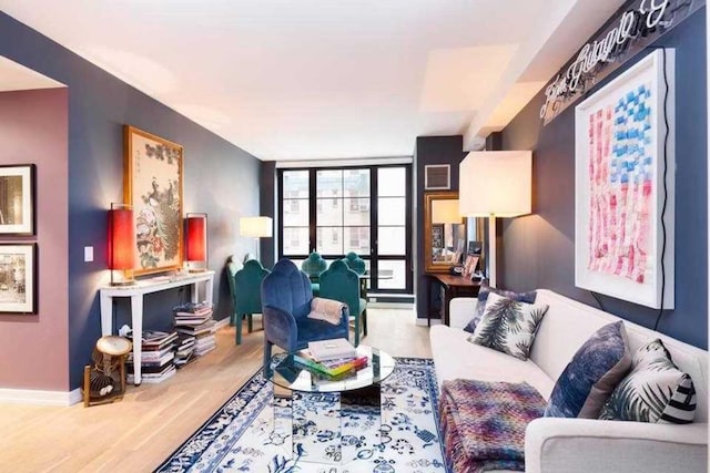 living room with light hardwood / wood-style flooring