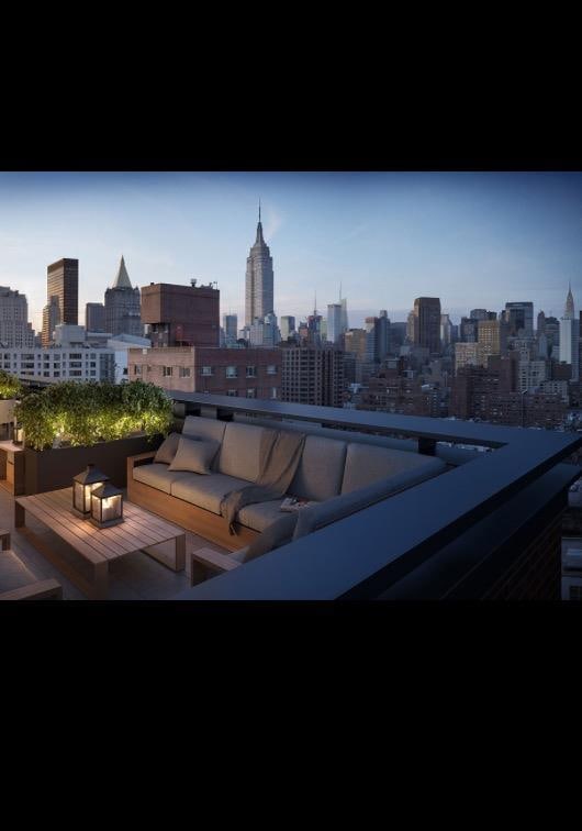 234 E 23rd St Unit 4-A, New York City, NY 10010 - view of patio featuring a view of skyline