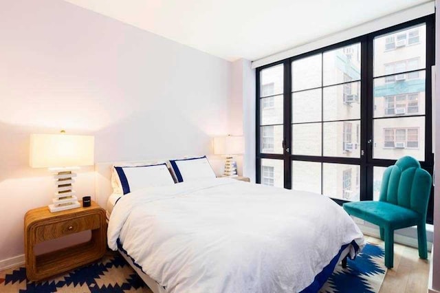 234 E 23rd St Unit 4-A, New York City, NY 10010 - bedroom featuring wood finished floors