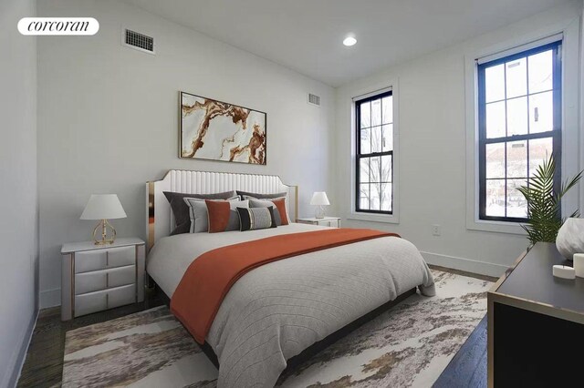 bedroom featuring wood-type flooring