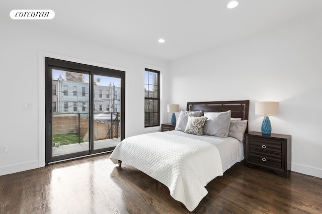 bedroom featuring visible vents, baseboards, access to exterior, and dark wood-style flooring