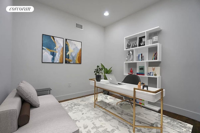 office featuring recessed lighting, wood finished floors, visible vents, and baseboards