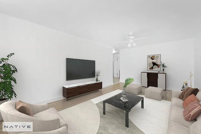 living room featuring ceiling fan and light wood-style flooring