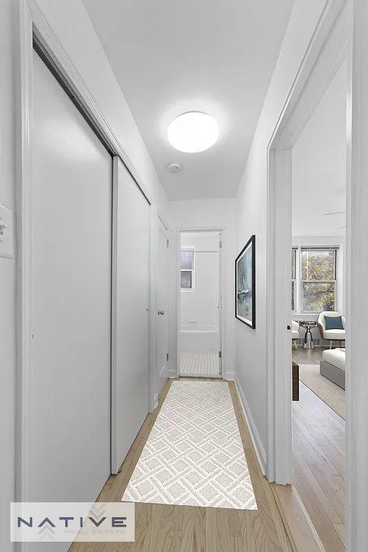 bedroom featuring light hardwood / wood-style flooring and ceiling fan