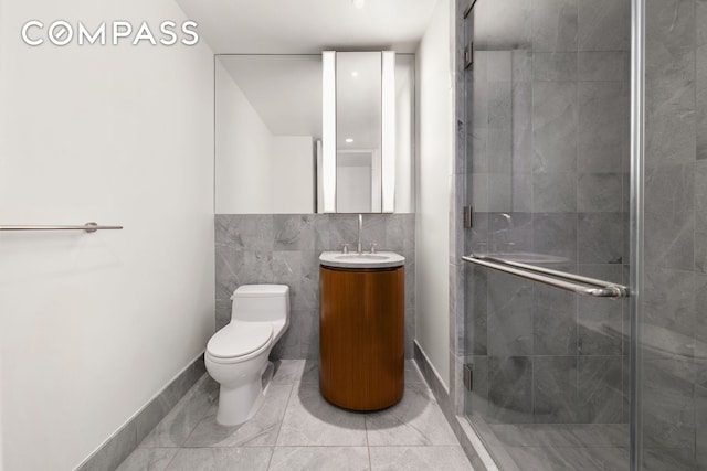 50 United Nations Plz Unit 6C, New York City, NY 10017 - full bath with vanity, a shower stall, and tile walls