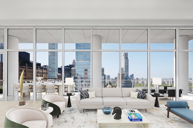 200 E 59th St Unit Ph32, New York City, NY 10022 - living area with floor to ceiling windows, a view of skyline, healthy amount of natural light, and wood finished floors