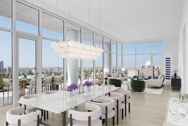 200 E 59th St Unit Ph32, New York City, NY 10022 - dining area with a city view, expansive windows, healthy amount of natural light, wood finished floors, and a chandelier