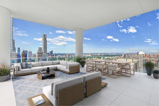200 E 59th St Unit Ph32, New York City, NY 10022 - view of patio / terrace featuring a skyline view, an outdoor living space, and outdoor dining space
