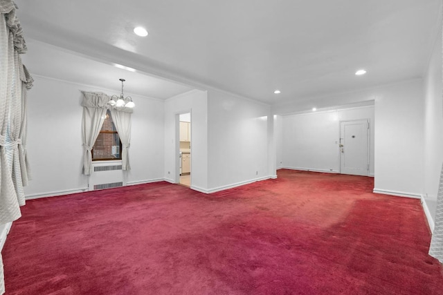 interior space featuring baseboards, radiator, carpet floors, a notable chandelier, and recessed lighting