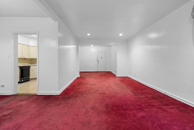 carpeted spare room featuring ornamental molding, recessed lighting, and baseboards