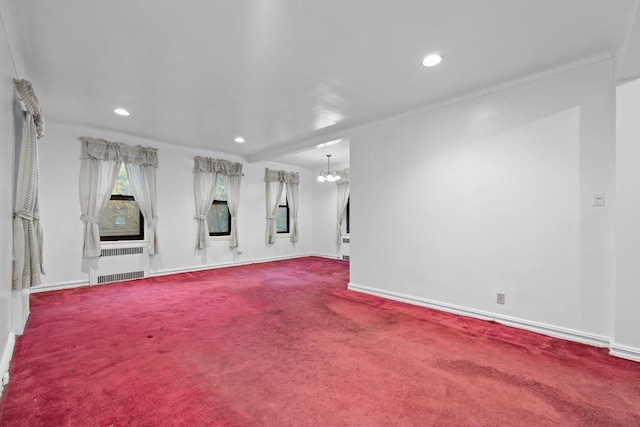 empty room featuring recessed lighting, radiator, an inviting chandelier, carpet flooring, and baseboards