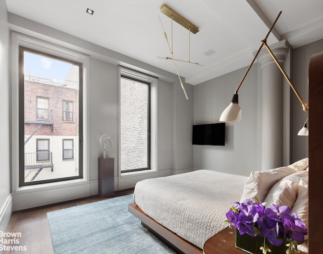 bedroom featuring wood finished floors