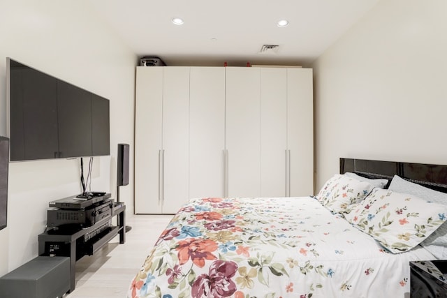 bedroom featuring light hardwood / wood-style flooring