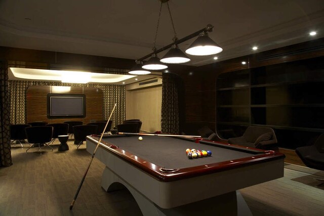 recreation room featuring hardwood / wood-style floors and pool table