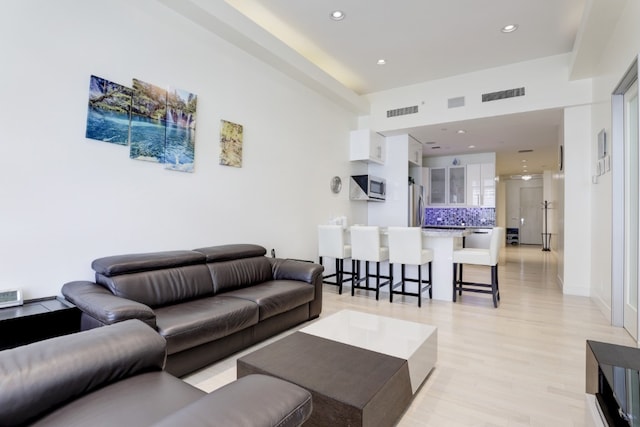 living room with light wood-type flooring