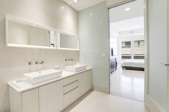 bathroom featuring vanity and tile patterned flooring