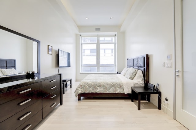 bedroom with light hardwood / wood-style floors