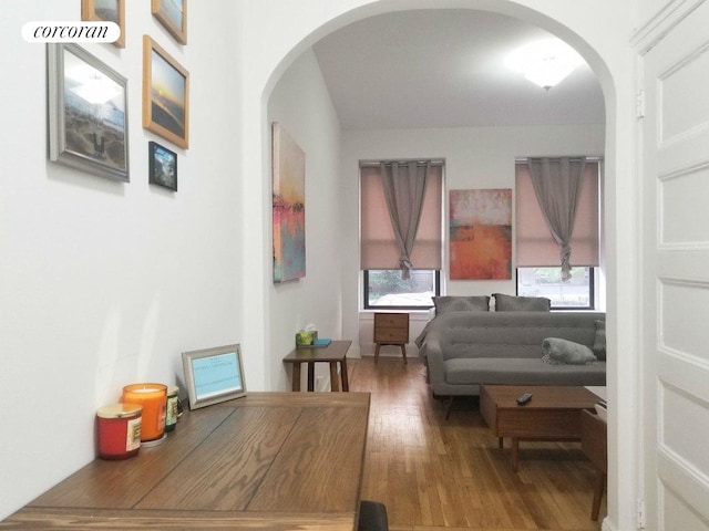 26 W 97th St Unit 1A, New York City, NY 10025 - sitting room featuring arched walkways and wood finished floors