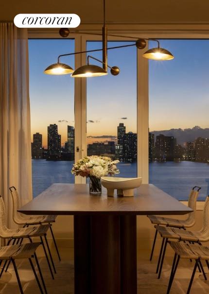 dining room with a water view