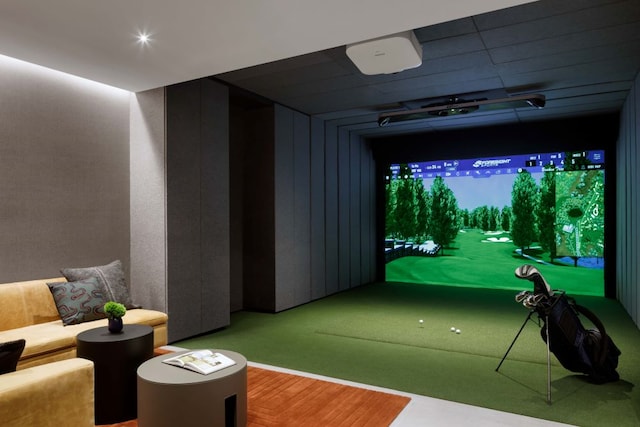 recreation room with golf simulator