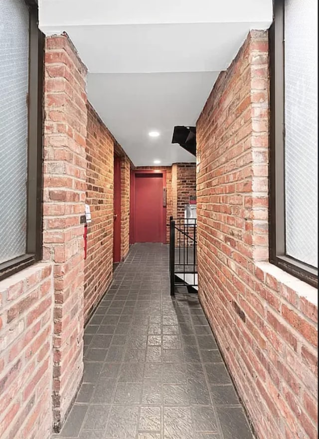 15 Jones St Unit 4D, New York City, NY 10014 - hall featuring brick wall