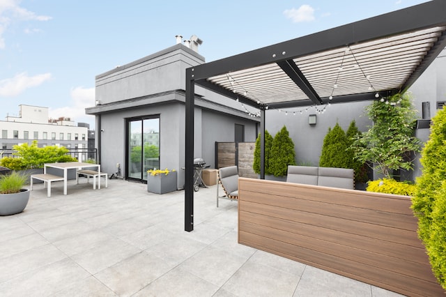 view of patio / terrace featuring outdoor lounge area, a pergola, and outdoor dining space