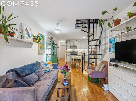 living room with hardwood / wood-style floors