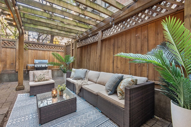 view of patio featuring outdoor lounge area, area for grilling, and a pergola