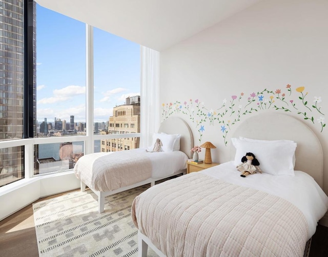 bedroom featuring multiple windows