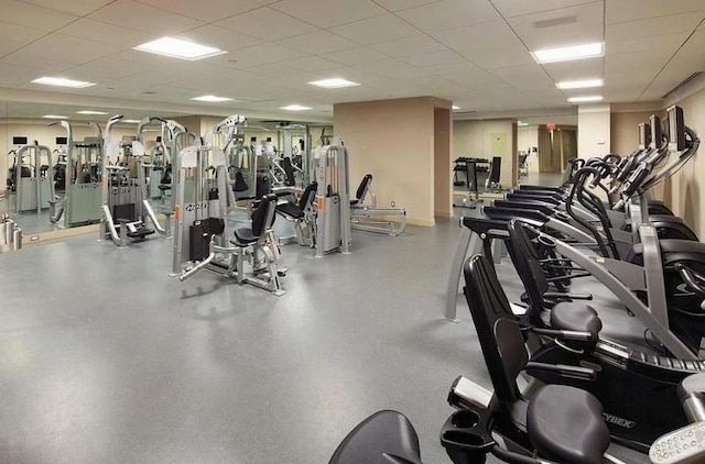 exercise room with a drop ceiling