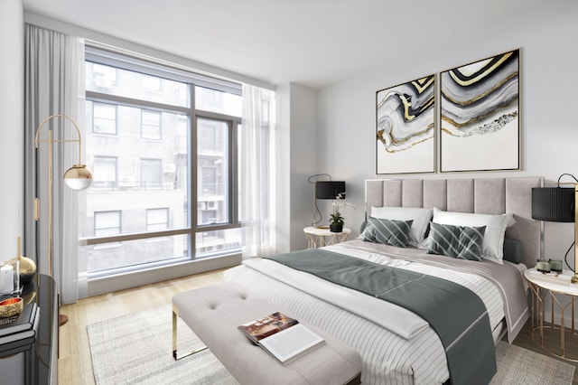 bedroom with light hardwood / wood-style floors