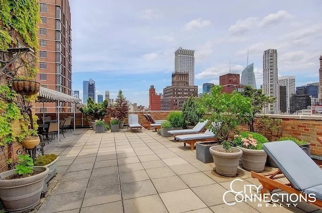 view of patio with a view of city