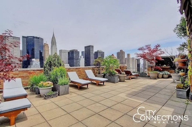 view of patio with a city view